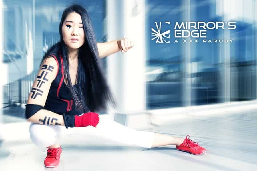 Mirrors Edge porn parody Asian pornstar Katana wearing Faith VR Cosplay X costume doing sideways lunge making fist in air
