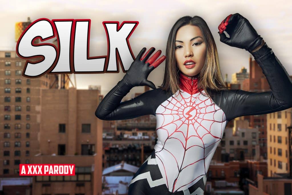 Asian model Silk doing Spider-man cosplay wearing black white and red latex suit XXX parody