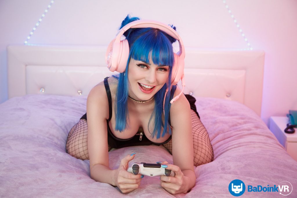gamer girl blue hair pink headphone nip slip